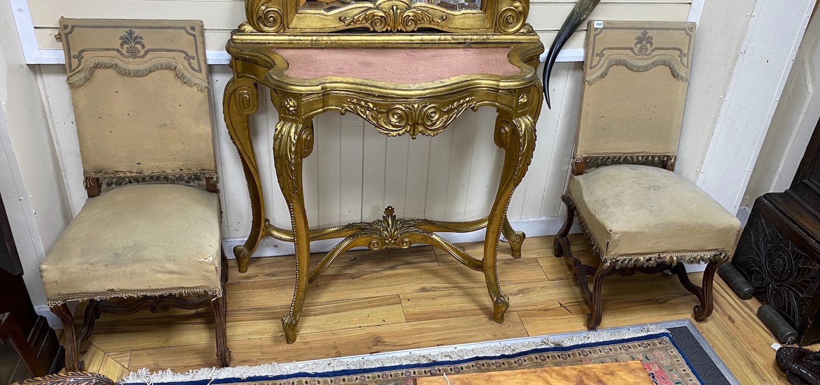 A pair Louis XVI style upholstered mahogany side chairs